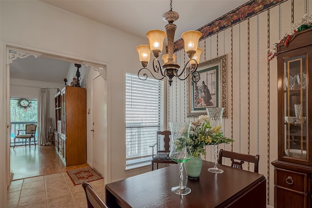 dining room featuring light hardwood / wood-style floors and an inviting chandelier