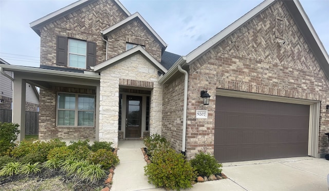 view of front of property with a garage