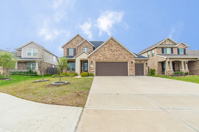 craftsman inspired home with a garage, covered porch, and a front yard