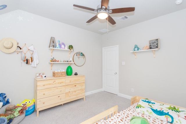 carpeted bedroom with ceiling fan