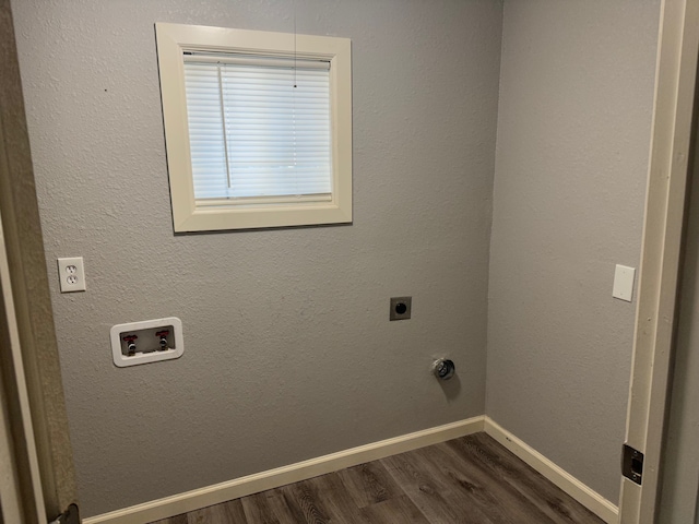 laundry room with hookup for an electric dryer, dark wood-type flooring, and washer hookup