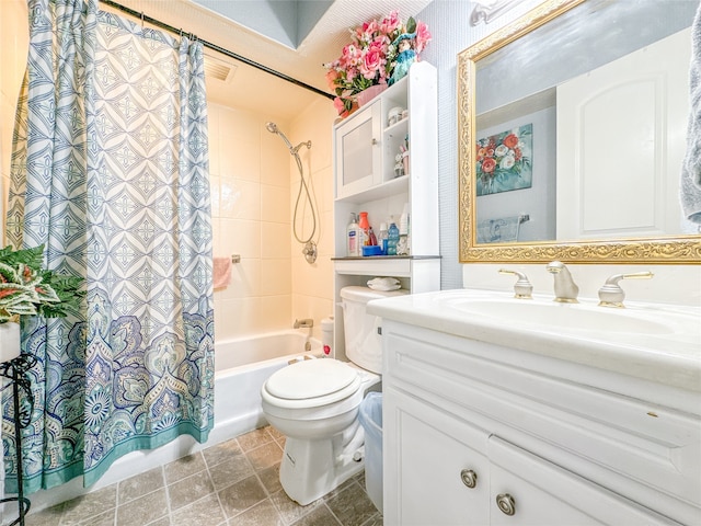 full bathroom with shower / bath combo, toilet, vanity, and tile patterned flooring