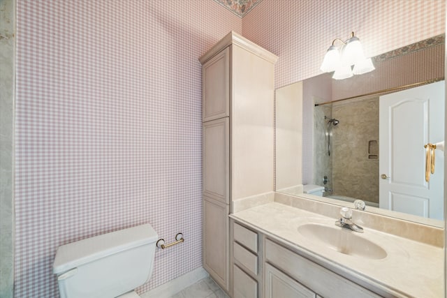 full bathroom with vanity, toilet, and tiled shower / bath