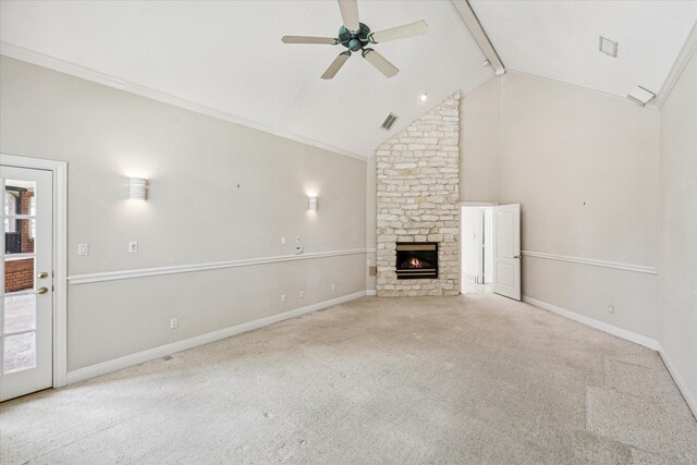 unfurnished living room with ceiling fan, light colored carpet, a fireplace, and high vaulted ceiling