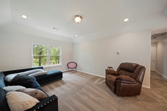 living room featuring light carpet