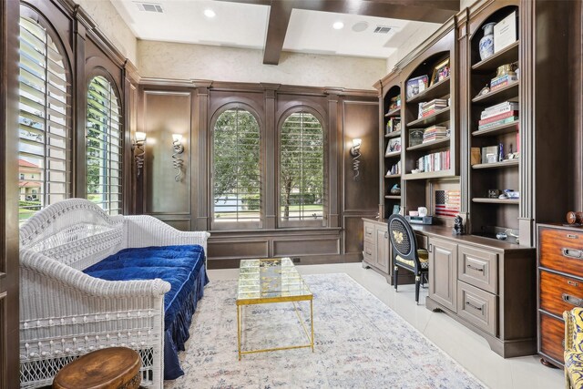 interior space featuring beamed ceiling and coffered ceiling