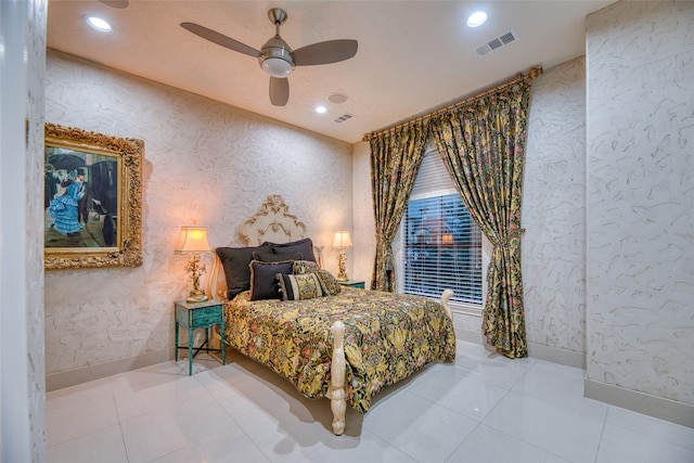 bedroom featuring ceiling fan and tile patterned floors