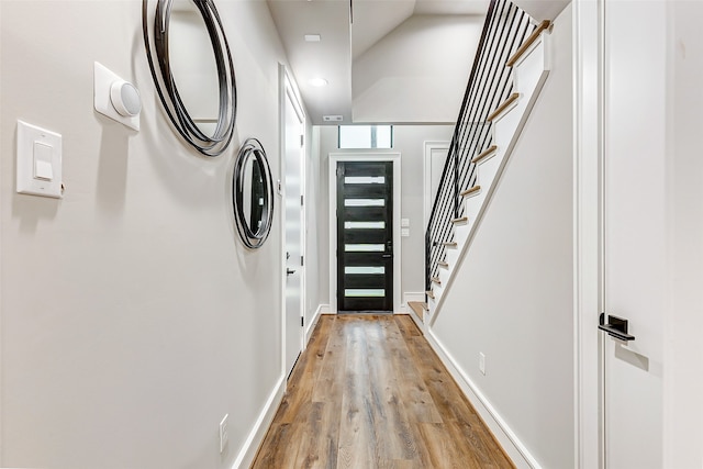 doorway to outside with light hardwood / wood-style floors