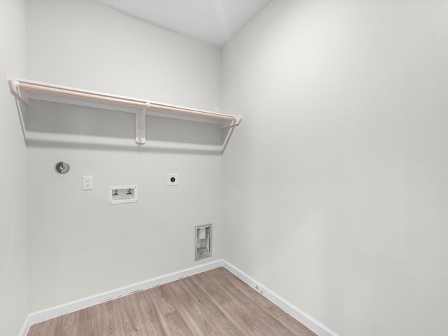 laundry room featuring washer hookup, hardwood / wood-style flooring, and electric dryer hookup