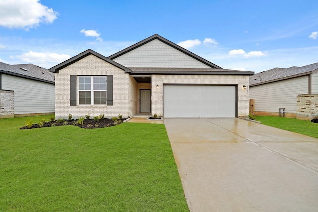 view of front of home with a front lawn and a garage