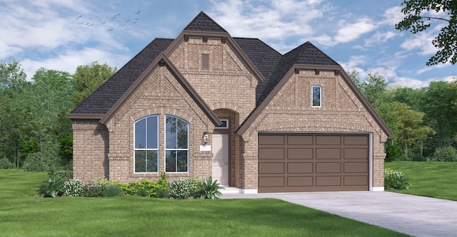 view of front of house with a garage and a front yard