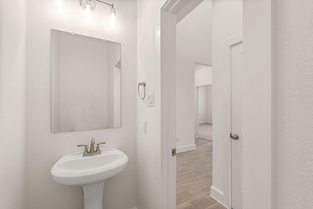 bathroom featuring baseboards