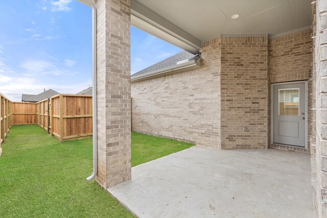 view of patio with a fenced backyard