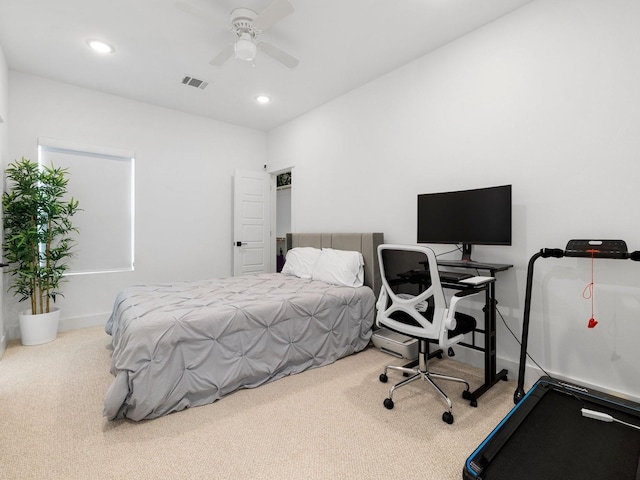 carpeted bedroom with ceiling fan