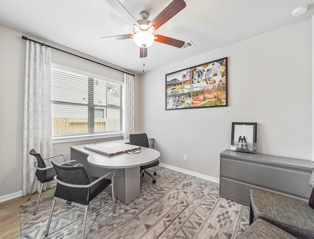 interior space featuring ceiling fan and light hardwood / wood-style floors