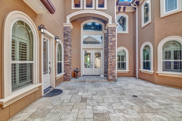 property entrance featuring french doors