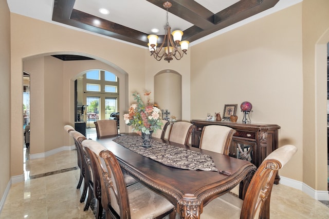 dining room featuring a notable chandelier and light tile patterned flooring