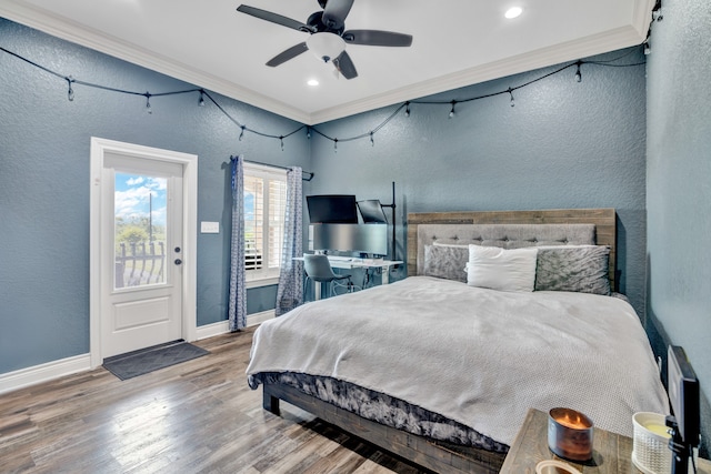 bedroom with hardwood / wood-style floors, ornamental molding, access to outside, and ceiling fan