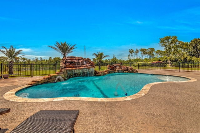 view of pool featuring a patio and pool water feature