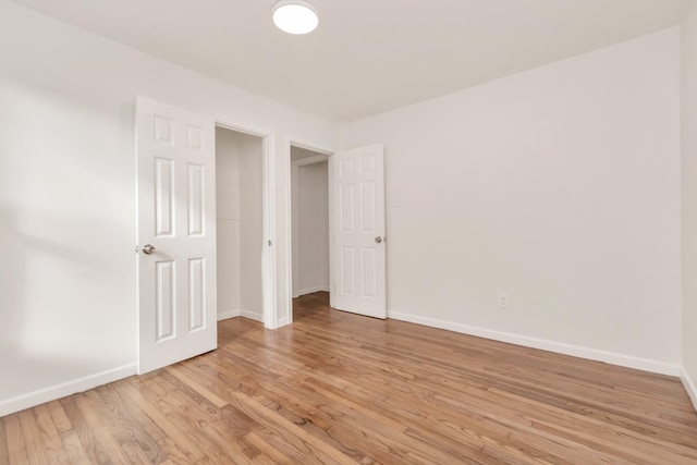 unfurnished bedroom featuring light hardwood / wood-style floors