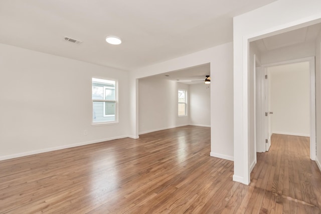 spare room with ceiling fan and light hardwood / wood-style flooring