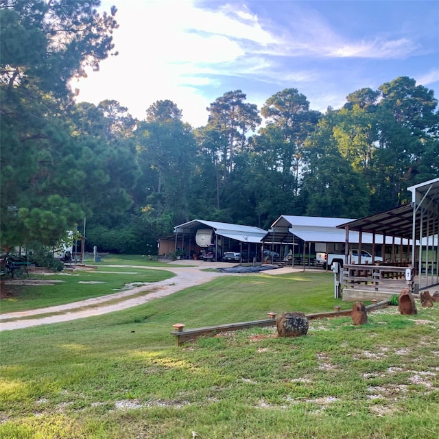 view of yard featuring a carport