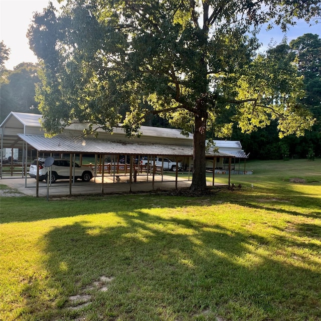 view of yard with a carport