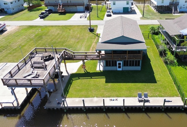 drone / aerial view with a water view