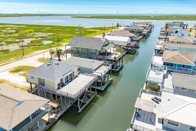 aerial view with a water view and a residential view