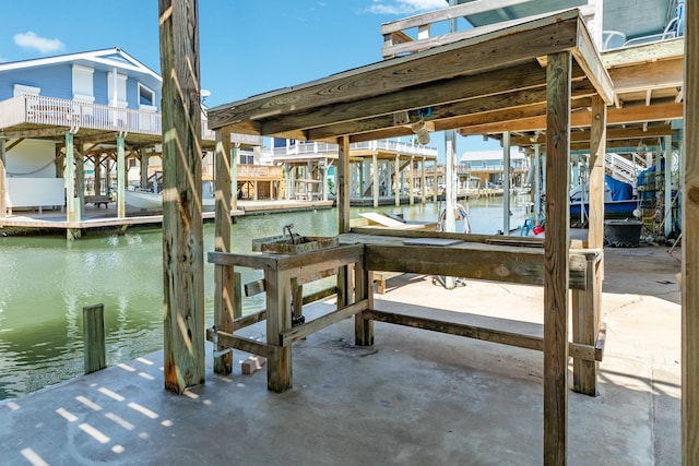 view of dock with a water view