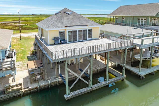 rear view of house with a water view