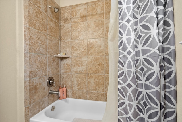 bathroom with shower / bathtub combination with curtain