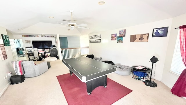 rec room featuring ceiling fan, carpet floors, and vaulted ceiling