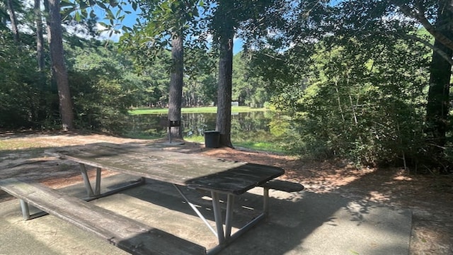 view of patio featuring a water view