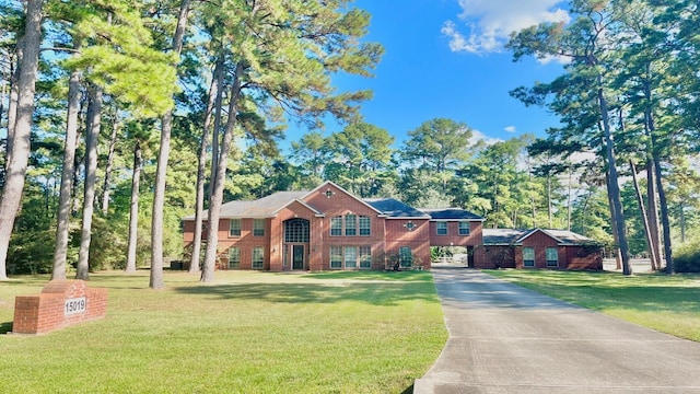 view of front of home with a front yard