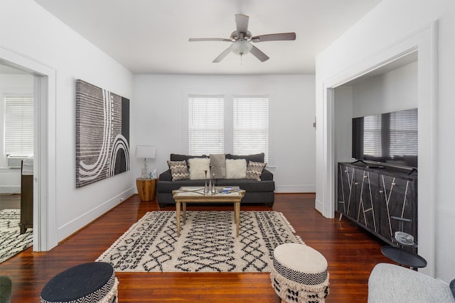 living room with ceiling fan, dark hardwood / wood-style flooring, and cooling unit