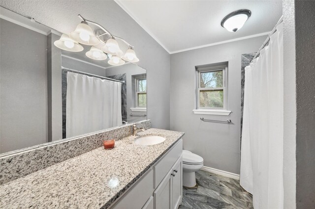 bathroom featuring vanity, tile patterned flooring, and toilet