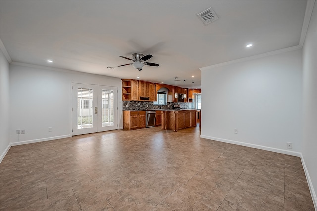 unfurnished living room featuring ceiling fan, light tile patterned floors, crown molding, and sink