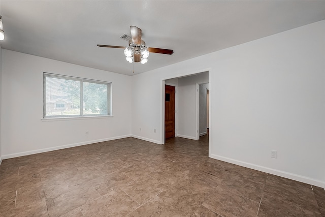 unfurnished room with ceiling fan