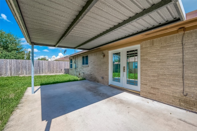 view of patio featuring french doors