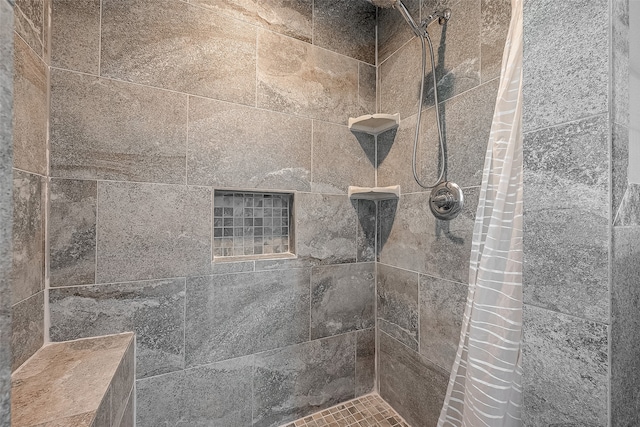 bathroom featuring curtained shower