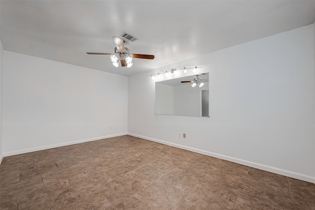 spare room with ceiling fan