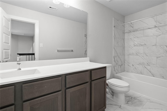 full bathroom featuring washtub / shower combination, toilet, and vanity