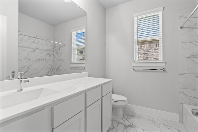 full bathroom featuring toilet, tiled shower / bath combo, and vanity