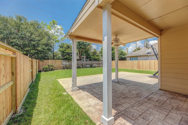 view of patio featuring ceiling fan