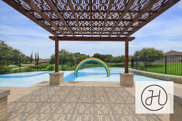 view of swimming pool with a pergola