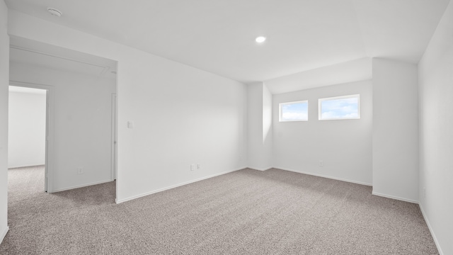 empty room with light colored carpet