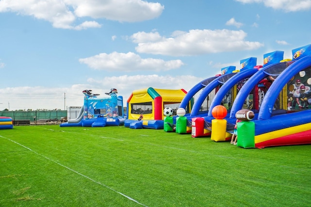 view of jungle gym with a yard