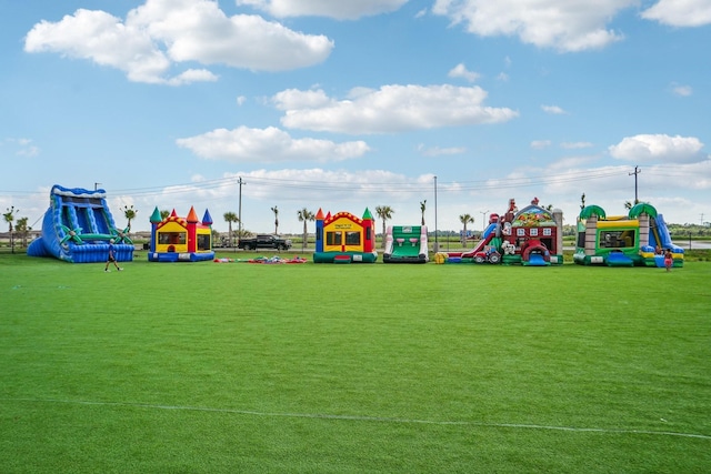 view of jungle gym featuring a yard