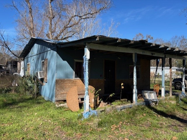 exterior space featuring a carport